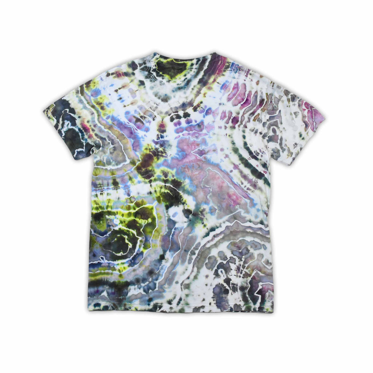 An artisanal ice-dyed t-shirt, its surface a canvas of swirling blues, purples, and chartreuse resembling geode formations, with the text 'dazed' in a stylized, icy lettering at the center.