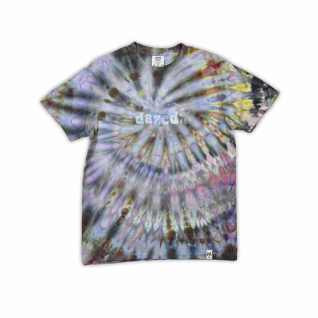 This t-shirt displays an intricate ice-dye effect that creates a starburst pattern with a mix of earthy and vibrant colors, highlighted by 'dazed' text in the middle in a style reminiscent of melting ice.