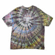 This t-shirt displays an intricate ice-dye effect that creates a starburst pattern with a mix of earthy and vibrant colors, highlighted by 'dazed' text in the middle in a style reminiscent of melting ice.