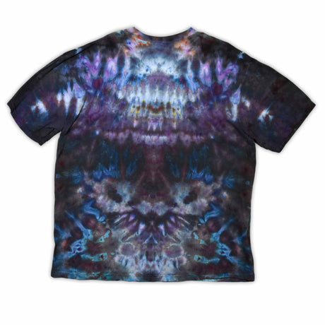 An ice-dyed t-shirt with a mesmerizing array of blues, purples, and subtle greens, reminiscent of a frozen geode, with 'dazed' in an icy font across the chest.