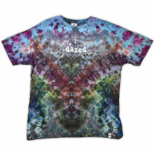 An ice-dyed t-shirt with a mesmerizing array of blues, purples, and subtle greens, reminiscent of a frozen geode, with 'dazed' in an icy font across the chest.