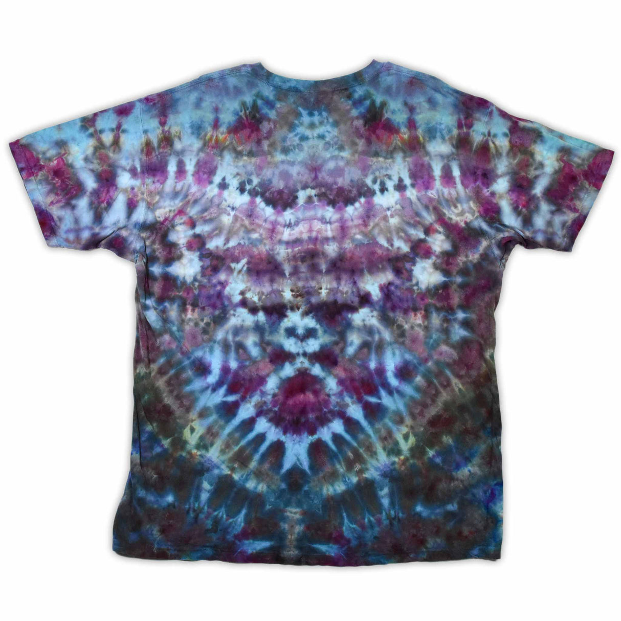 An ice-dyed t-shirt with a mesmerizing array of blues, purples, and subtle greens, reminiscent of a frozen geode, with 'dazed' in an icy font across the chest.