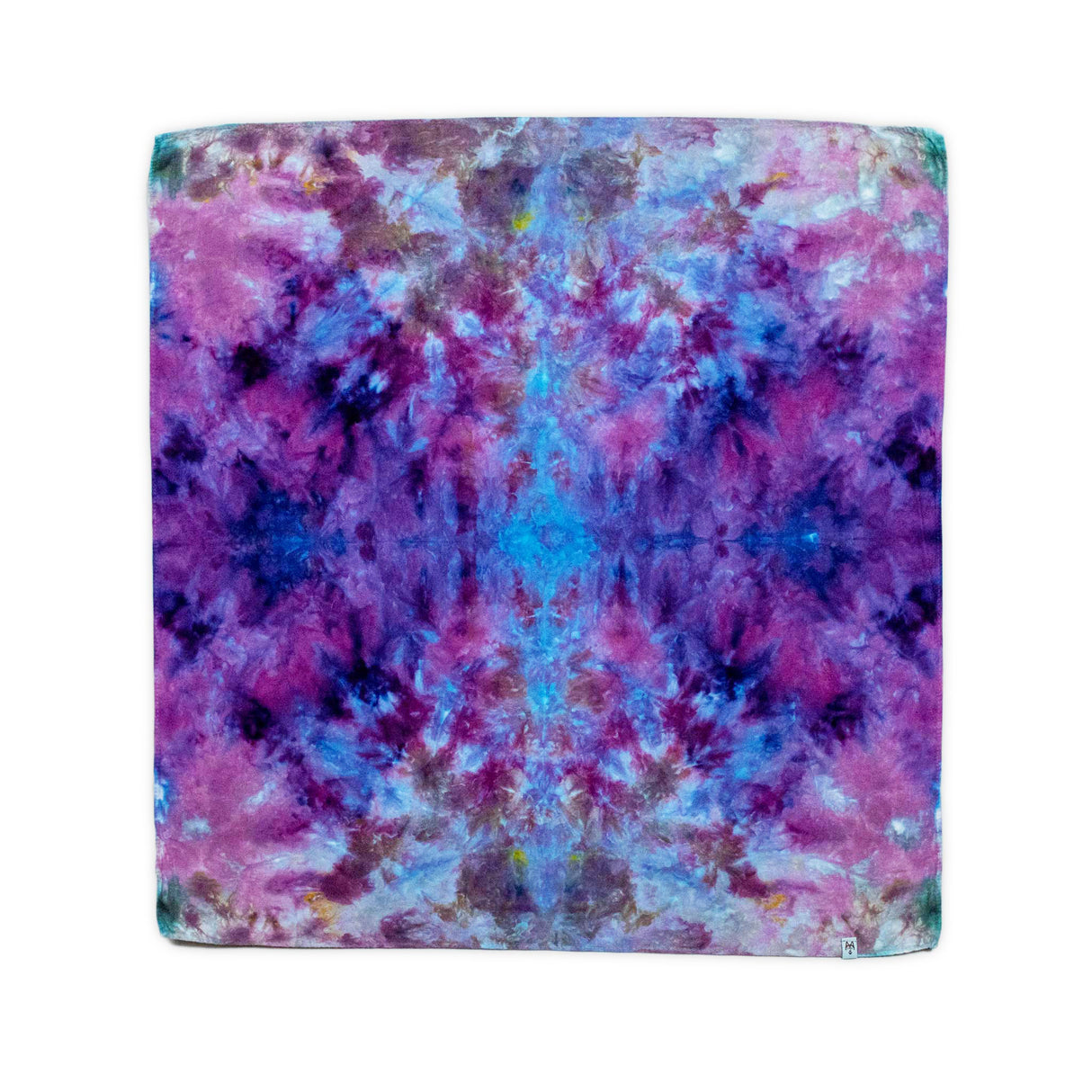 An ice-dyed bandana featuring a mirage of cool shades, where splashes of royal purple blend into pools of sapphire and lilac.
