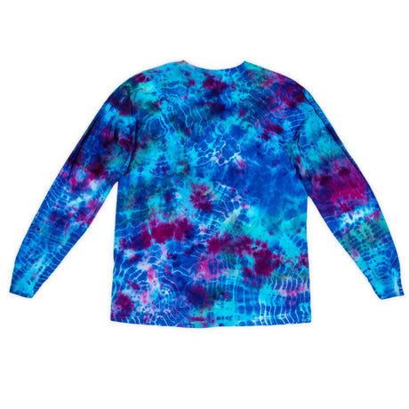 This long sleeve shirt boasts a bold tie-dye pattern with deep blues and bright pinks, reminiscent of a cosmic nebula.