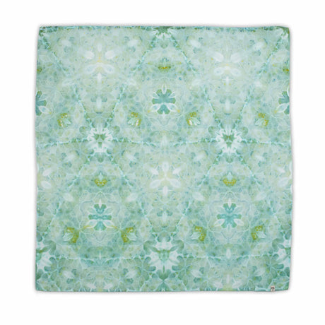 A soothing green tie-dyed bandana with a delicate pattern that mimics a garden of abstract flowers, featuring various shades of green and subtle yellow highlights.A soothing green tie-dyed bandana with a delicate pattern that mimics a garden of abstract flowers, featuring various shades of green and subtle yellow highlights.