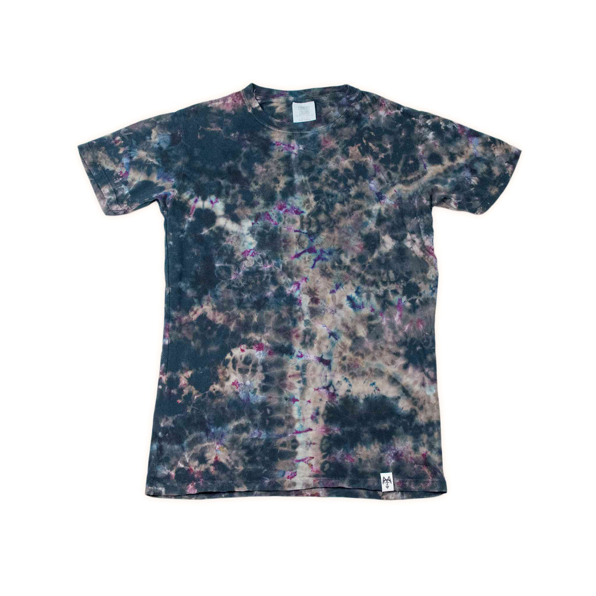 This unique t-shirt boasts a reverse dye effect, displaying a cosmic blend of dark hues with subtle pops of pink and purple against a black and brown backdrop.