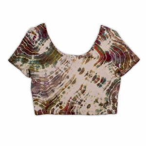 A casual, ice-dyed scoop neck top showcasing a hypnotic array of swirls and lines in colors inspired by the earth, including dark green, terracotta, and sand.
