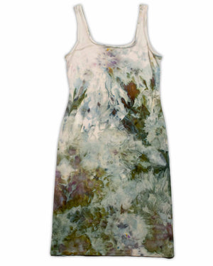 An artistic ice-dyed dress with a gentle color palette, featuring smudged impressions of olive, mauve, and earthy tones for a natural look.