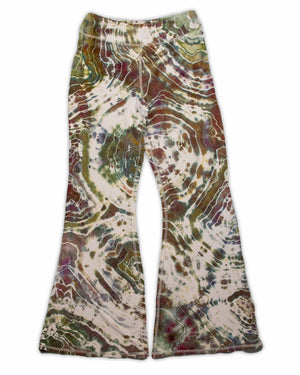 A pair of ice-dyed wide-leg pants that evoke the colors of the earth, with detailed patterns in shades of sage, wine, and sandstone.