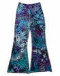 A pair of hand-dyed pants showcasing a unique ice-dye technique with organic patterns in a striking combination of sapphire, violet, and seafoam green.