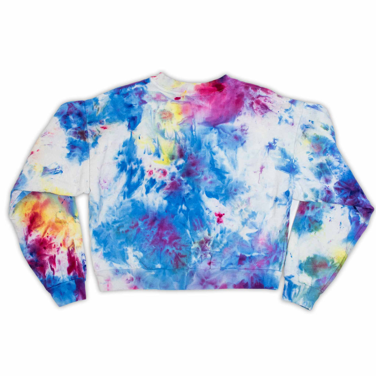 A snug and stylish cropped sweatshirt for women, with an eye-catching ice dye mix of warm pinks, cool blues, and vibrant yellows, perfect for a cozy day in or a casual outing.