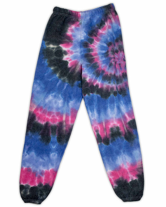 A pair of cozy sweatpants with a vibrant tie-dye pattern in shades of blue, pink, and black, with a classic spiral design.