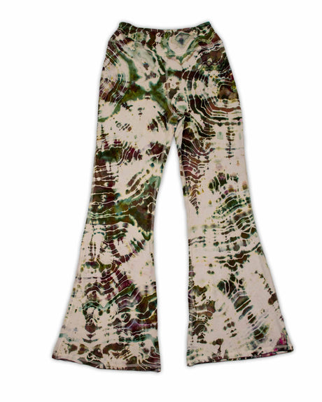 A pair of ice-dyed wide-leg pants that evoke the colors of the earth, with detailed patterns in shades of sage, wine, and sandstone.