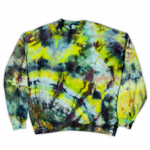 A casual and cozy sweatshirt enriched with the charm of ice dye, showcasing a playful mix of yellow, blue, and green hues that invoke a sense of warmth.